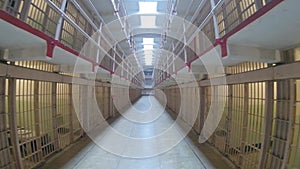 Walking down a corridor with prison cells, Alcatraz, San Francisco