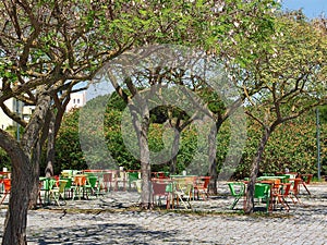 Walking the footpath Passeio do Tejo along Tagus river in Lisbon at the Expo park - empty cafe photo