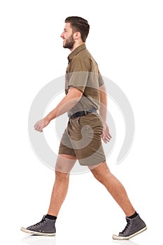 Walking man in khaki uniform