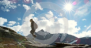 Walking, mountain or woman hiking on in nature adventure to explore on outdoor holiday vacation. Low angle, exercise or