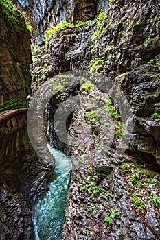 Walking Through a narrow gorge at Breitachklamm