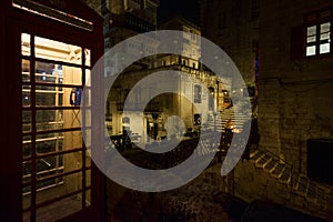 Walking through the night Malta. Maltese style. Old phone booth