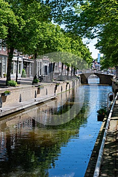 Walking on old streets of Harlingen fisherman town on Wadden sea, Friesland, Netherlands