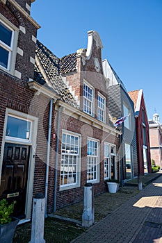 Walking on old streets of Harlingen fisherman town on Wadden sea, Friesland, Netherlands