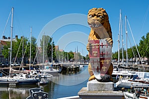 Walking on old streets of Harlingen fisherman town on Wadden sea, Friesland, Netherlands