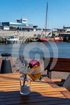 Walking on old streets of Harlingen fisherman town on Wadden sea, Friesland, Netherlands