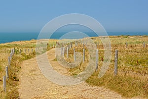 Walking path on the ciffs on the French Northe sea coast photo