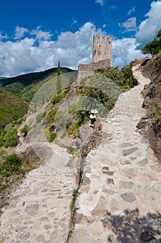 Walking path and La Tour Regine tower at Lastours