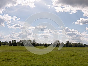 A walking path through an open countryside in the heartland of c