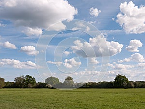 A walking path through an open countryside in the heartland of c