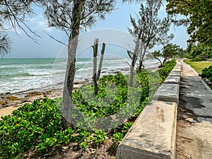 Walking path beside a sea wall in Bahamas