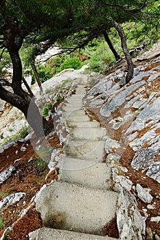 Walking path with steps in Calanques de Sugiton, Marseille, France