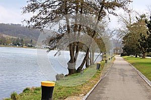 Walking promenade along the Moselle River in Remich, Luxembourg in early spring time