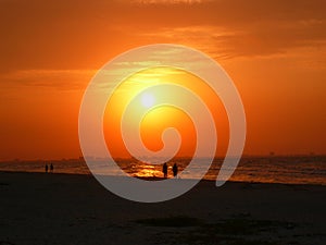 Walking in red sunlight at sanibel