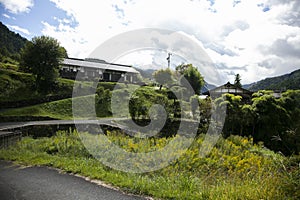 Walking the road following the Nakasendo trail between Nagiso and Tsumago in Kiso Valley, Japan.