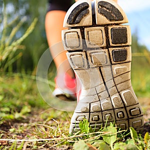 Walking or running legs in forest, adventure and exercising