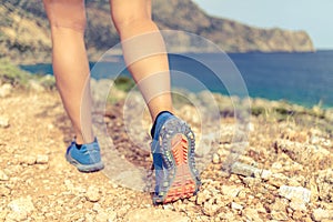 Walking or running legs in forest, adventure and exercising