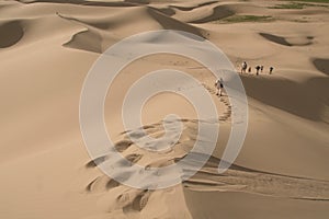 Walking on sand dunes