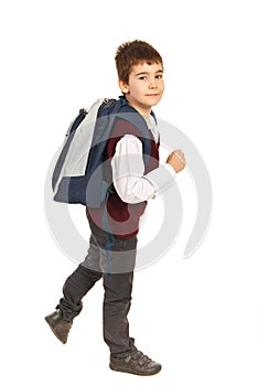 Walking school boy in a hurry