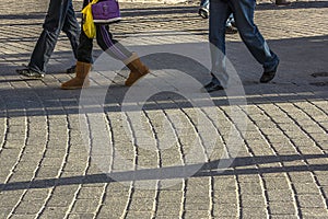 Walking on sidewalk photo