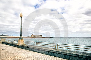 Walking street along Atlantic Ocean in Arrecife photo