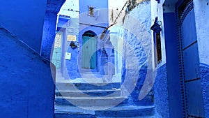 Walking in the street in old blue medina of the Chefchaouen City, Morocco