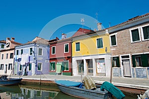 Walking through the streets of Burano. Colorful houses.