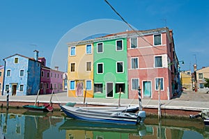 Walking through the streets of Burano. Colorful houses.