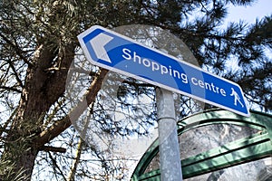 Walking to Shopping Centre mall arrow sign