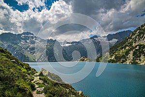 Walking trail around beautiful Gelmersee lake in Switzerland