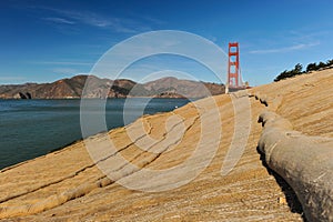 Walking trail next to ocean with erosion control mesh