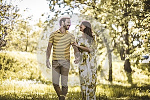 Walking trough nature. Heterosexual couple.