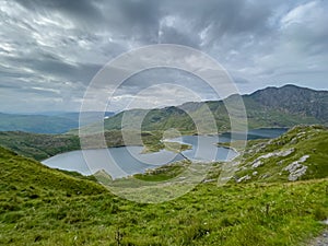 Walking up Pyg Track, Yr Wyddfa (Snowdon) highest mountain in Wales, Gwynedd, Wales photo