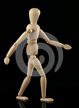 Walking wooden figure
