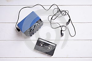 Walkman with earphones and mixtape