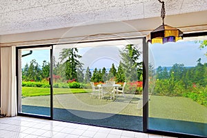 Walkout basement from living room overlooking beautiful view photo