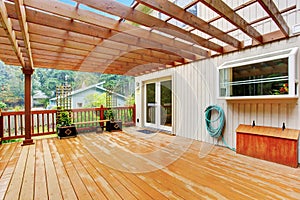 Walkout deck with attached pergola