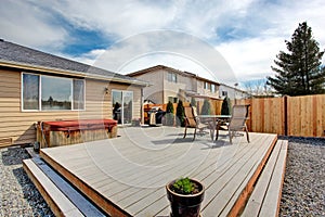 Walkout deck with patio area and jacuzzi