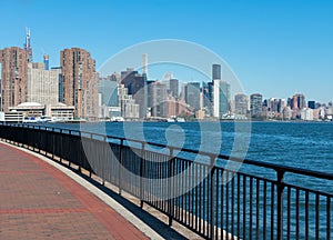 Walkway along the East River with the Midtown New York City Skyline