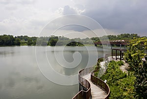 Walkway and bridge over a river photo