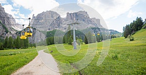 walkway from Colfosco to Pisciadu Waterfall, Dolomite Alps, cable car to Grodner Joch