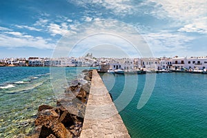 Walkway at the harbor of the small fishing village of Naousa, Paros in Greece