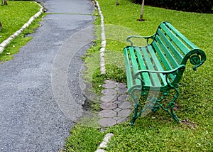 Walkway in the park and green grass