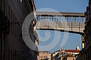 Walkway of the Santa Justa Lift above the rooftops in Lisbon