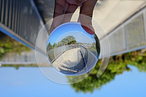 The walkway on the top rampart captured through a lens ball near Fort Desoto Park, St Petersburg, Florida, U.S.A