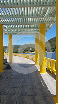Walkway and yellow columns in Guanica, Puerto Rico photo