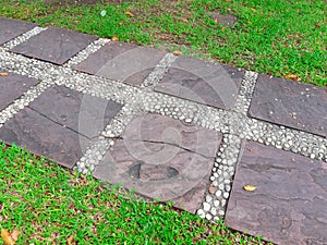 Walkways of parks. Garden path of paving slabs in the garden Floor panels,