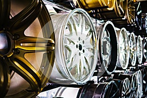 wall of alloy car wheels in store