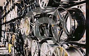 wall of alloy car wheels in store