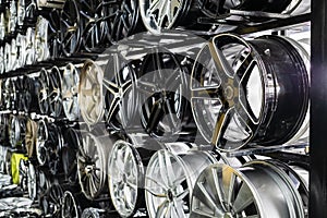 wall of alloy car wheels in store